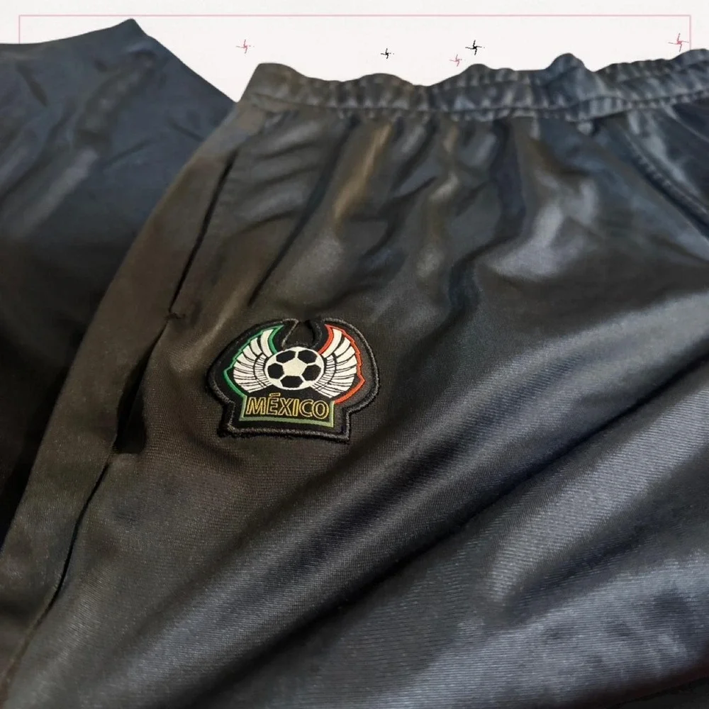 Sleek black Mexico track pants